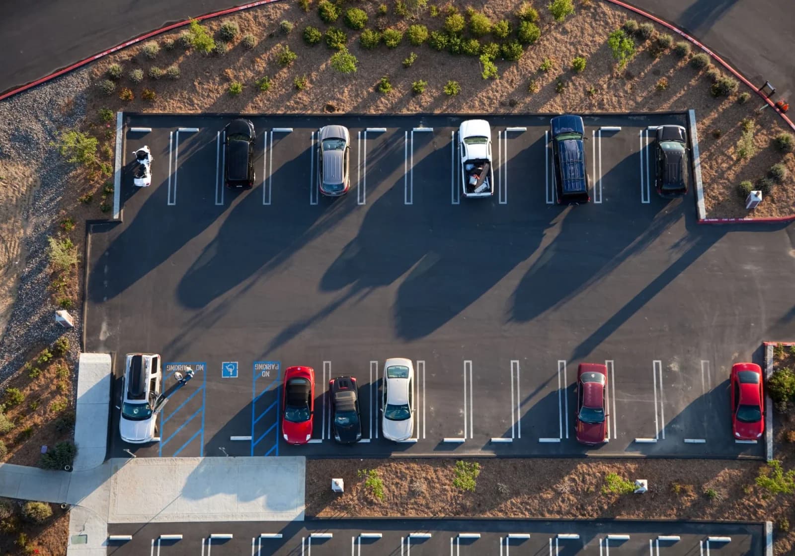 Aerial of a striped commercial parking lot by DECOMA Industries